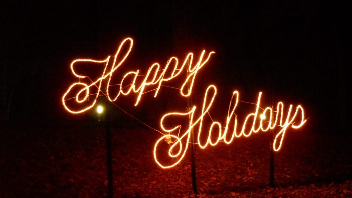 light up neon saying happy holidays