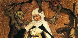 A painting of St. Catherine of Siena, who is wearing a white habit and is surrounded by devilish-looking creatures.