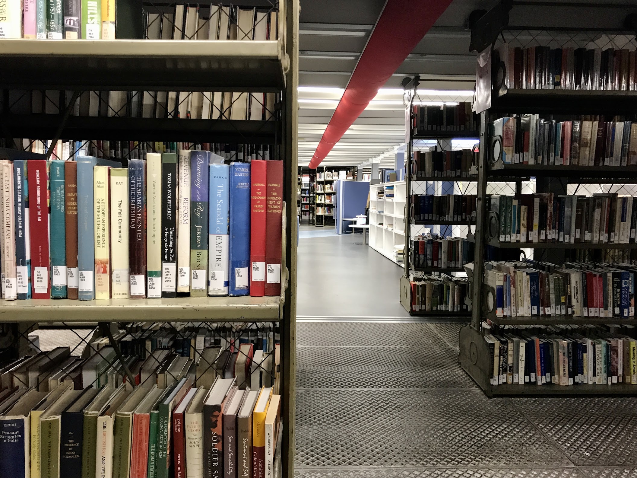 A photo taken in the Gladstone Link, showing bookshelves. 