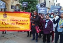 Protestors from the Oxford Hindu Community protesting with signs and banners demanding a Hindu Temple and Community Centre.