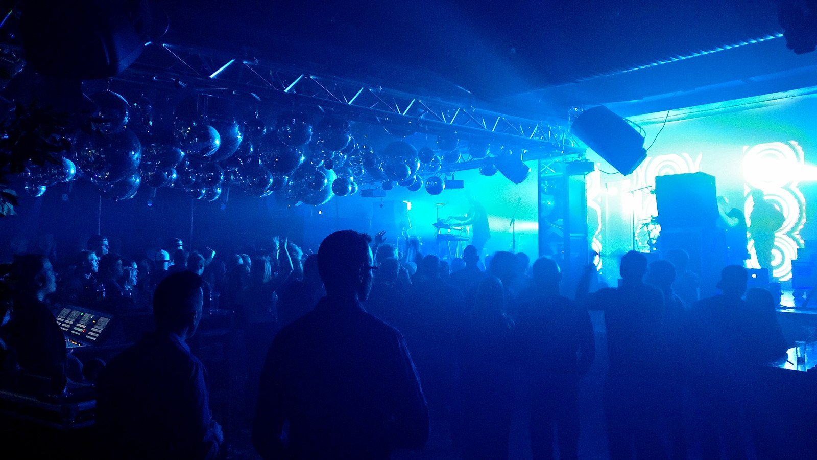 Nightclub lit by blue light