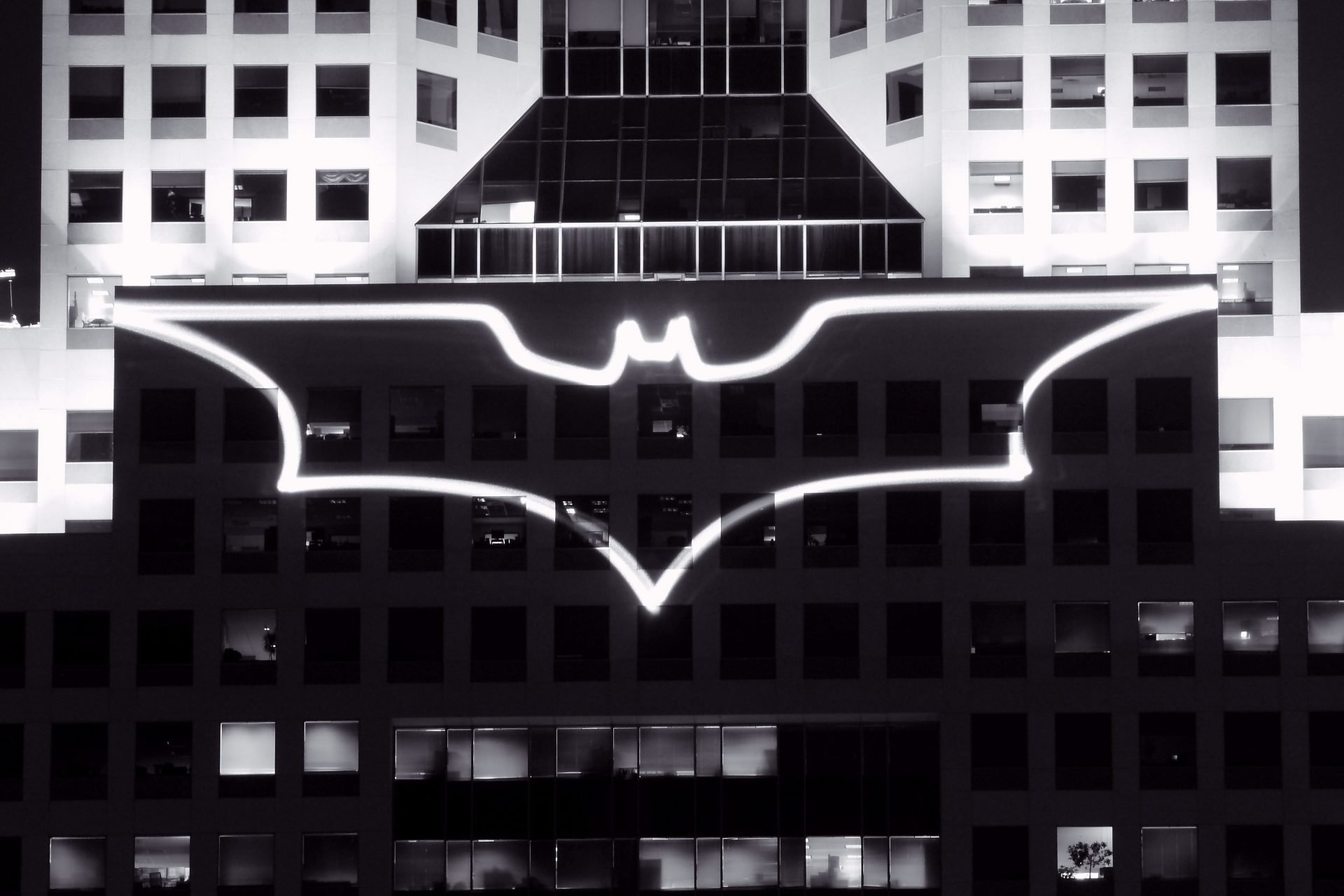 Batman symbol projected onto building