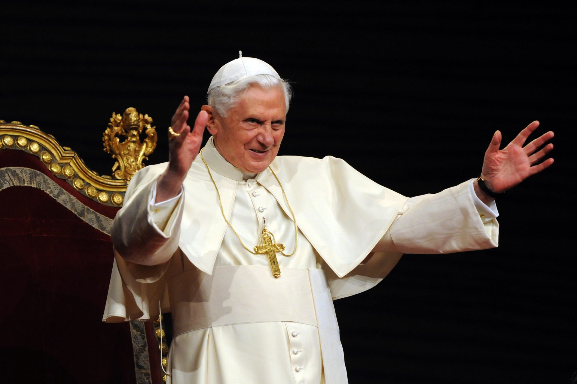 Pope Benedict XVI raising his arms in prayer