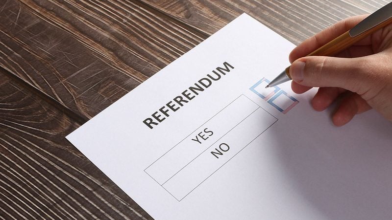 A Sheet of Paper titled Referendum with an option to vote for either Yes or No