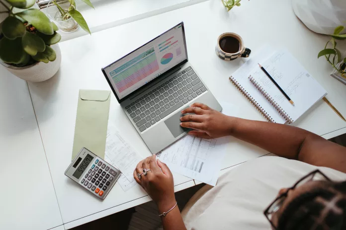 woman sitting at a desk and working