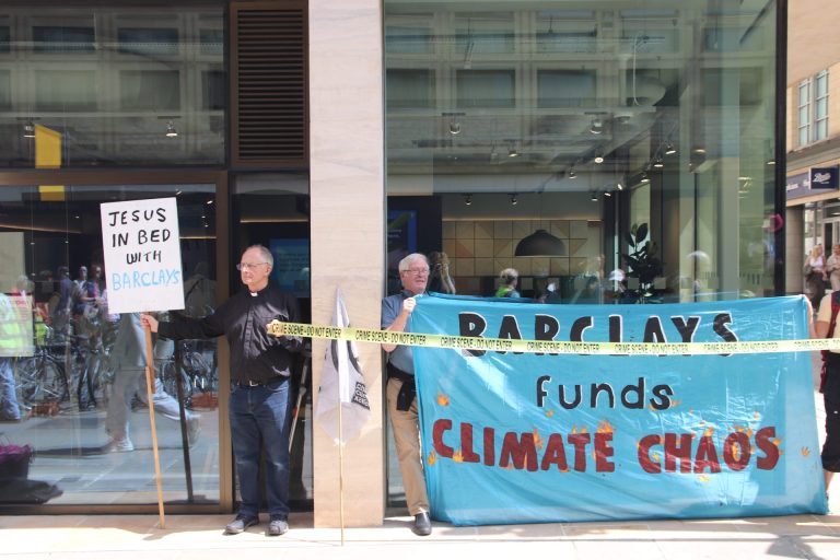 Extinction Rebellion protests the opening of Barclays on Cornmarket Street