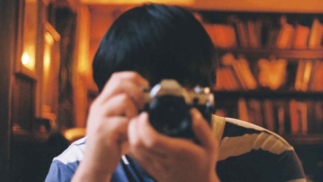 Man taking photo with a camera