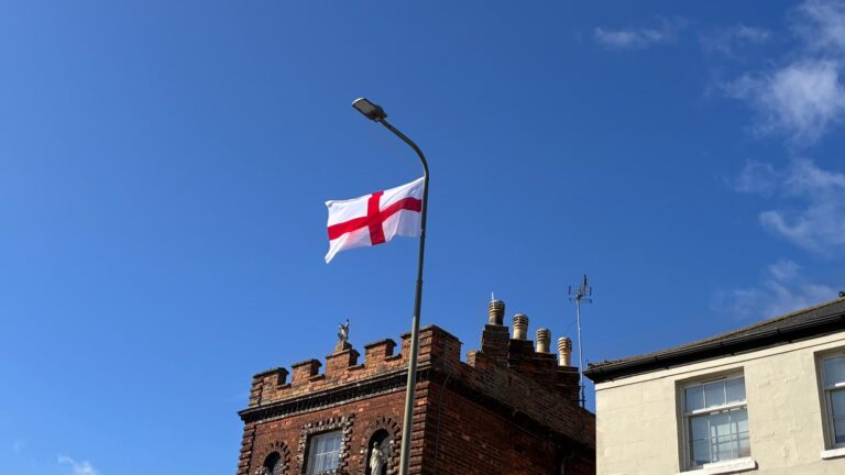 Police investigate group hanging England flags amid safety concerns